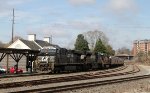 NS 7681 leads grain train 56Z past the station